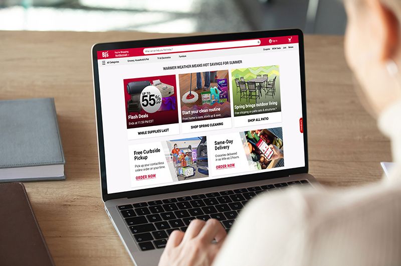 Person shopping groceries on a laptop