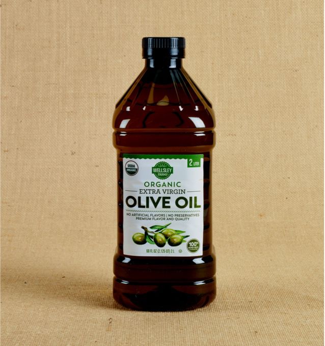 photo of organic wellsley farms extra virgin olive oil bottle on burlap