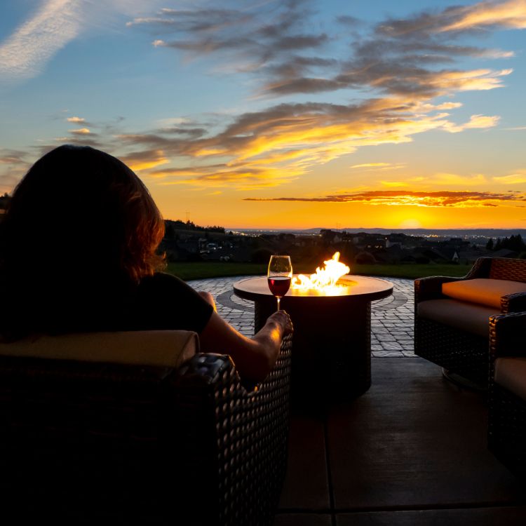 Family enjoying outdoor dinner outdoors, late afternoon in 2023