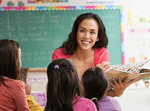 Teacher in front of class, has a discounted BJ's membership