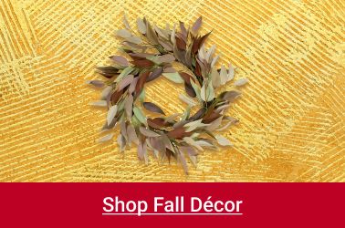 Text: Shop fall decor. Image: Fall wreath over a yellow burlap texture.