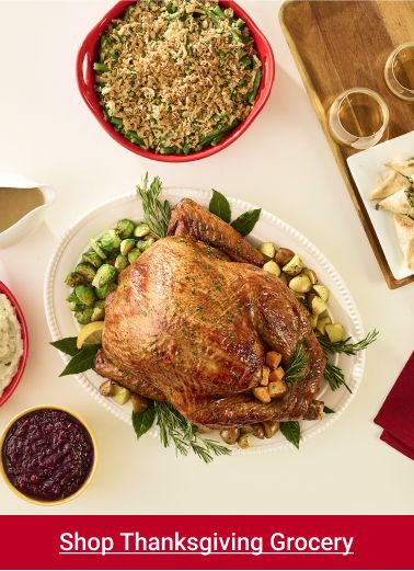 Text: Shop thanksgiving grocery. Image: Flat lay photo of a table with Thanksgiving food.