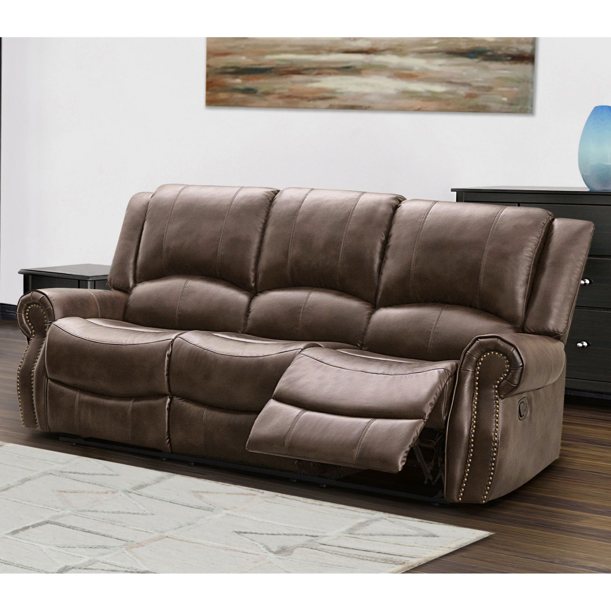 Leather reclining sofa with best sale nailhead trim