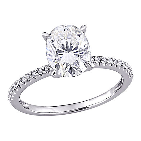2 ct. DEW Created Moissanite and .1 ct. t.w. Diamond Oval Engagement Ring in 14k White Gold