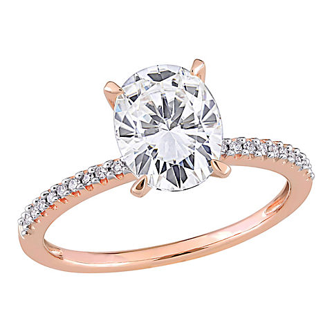 2 ct. DEW Created Moissanite and .1 ct. t.w. Diamond Oval Engagement Ring in 14k Rose Gold