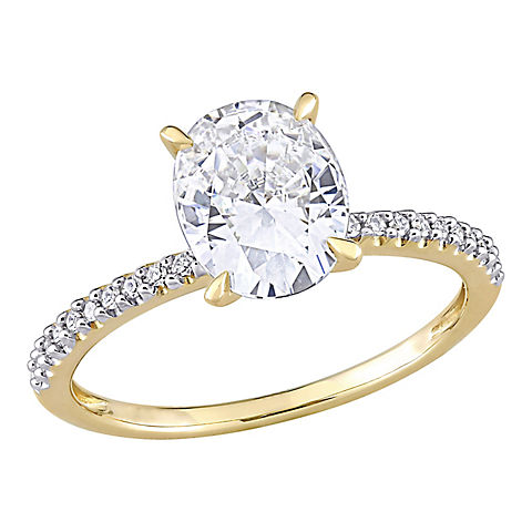 2 ct. DEW Created Moissanite and .1 ct. t.w. Diamond Oval Engagement Ring in 14k Yellow Gold