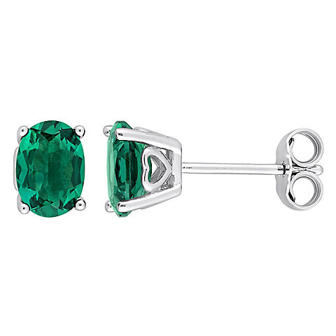 1.38 ct. t.g.w. Oval Created Emerald Stud Earrings in Sterling Silver