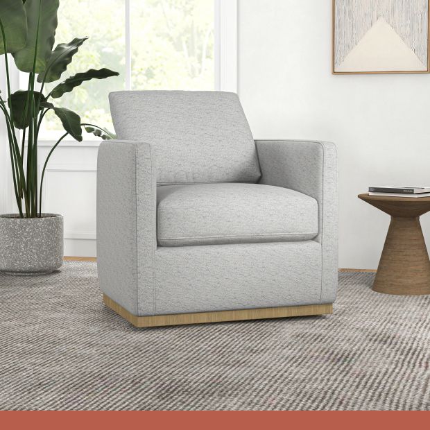 A light gray sofa chair.