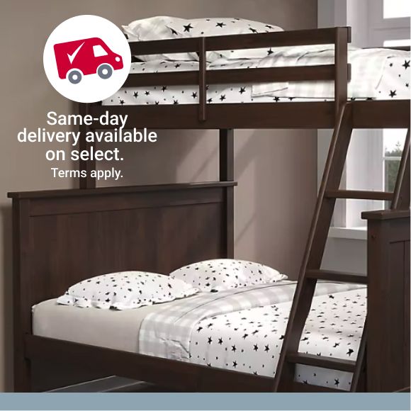 Text stating "Free delivery on select items." in front of a dark wood bunk bed.