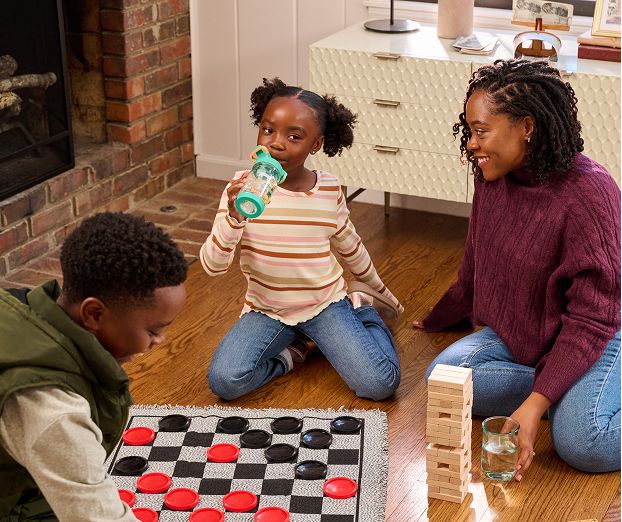Healthy mother and children together having a good time